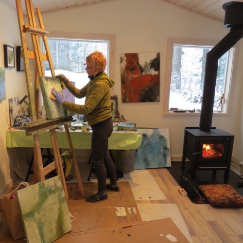 Artist Painting In Studio